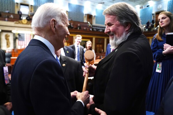 President Joe Biden, left, greets Rep. Doug LaMalfa, R-Calif., after delivering the State of the Union address to a joint session of Congress at the Capitol, March 7, 2024, in Washington. (Shawn Thew/Pool via AP, FIle)