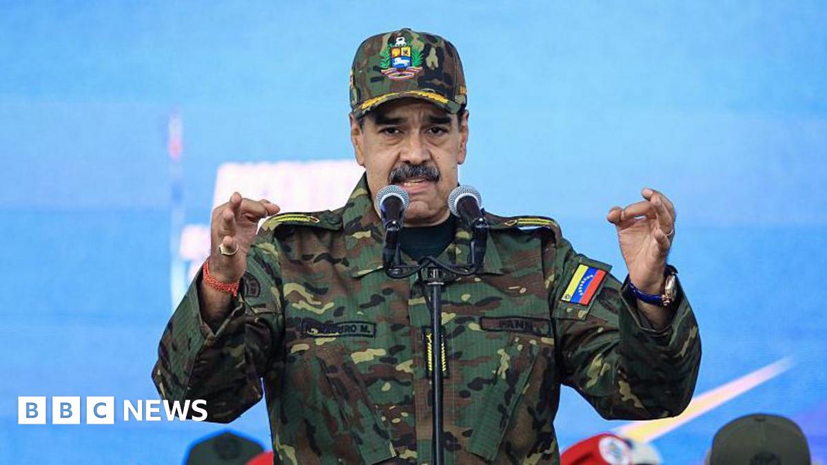 Nicolás Maduro pictured in military clothing during a ceremony