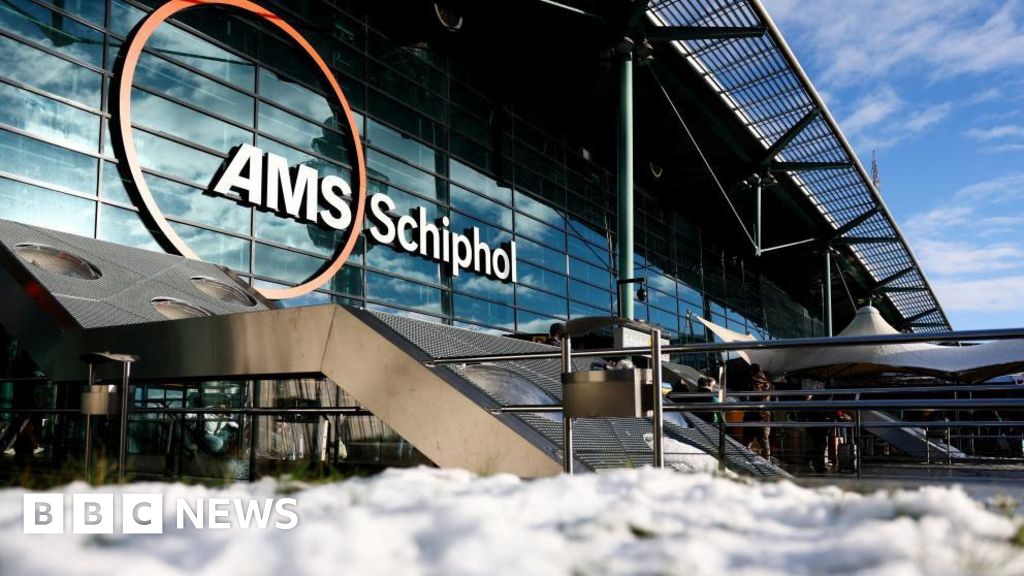 Hundreds of flights cancelled as big freeze grips western Europe