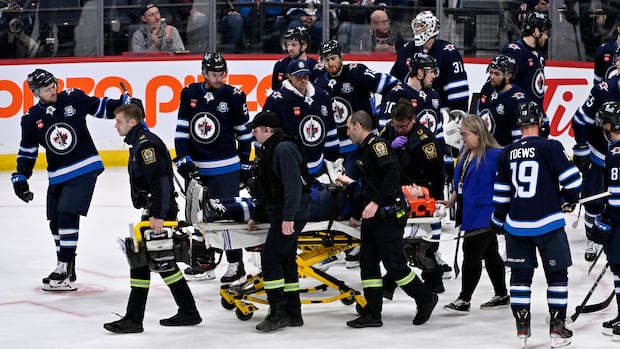 Jets defenceman Fleury stretchered off, Vegas rallies to hand Winnipeg 10th straight loss