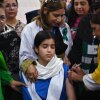 A health worker administers the human papillomavirus (HPV) vaccine to a school student in Islamabad, Pakistan on September 24, 2025, during a HPV vaccination drive against cervical cancer, most frequently diagnosed in women.