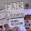 Demonstrators rally outside of the Ohio Statehouse to protest gerrymandering and advocate for lawmakers to draw fair maps in September in Columbus, Ohio.