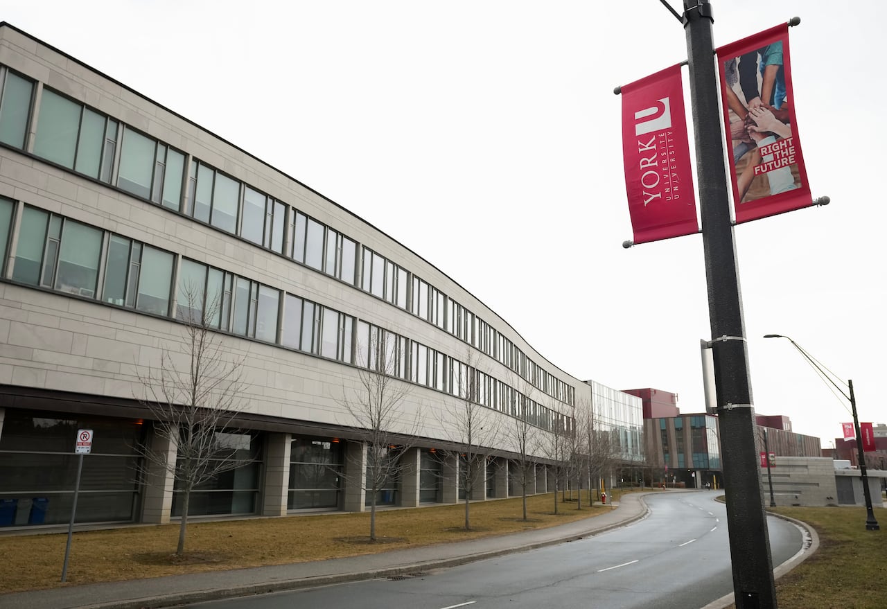 A sign in front of a building.