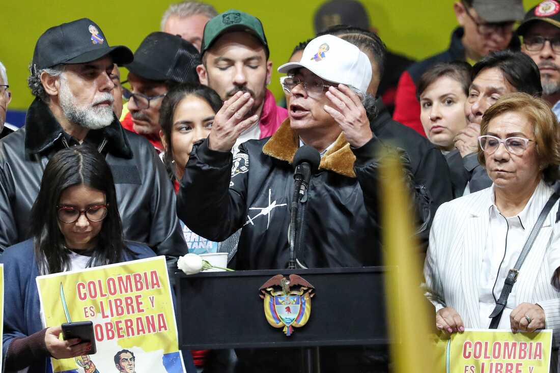 Colombian President Gustavo Petro addresses supporters in a rally he called to protest comments by U.S. President Donald Trump, in Bogota, Colombia, Wednesday, Jan. 7, 2026. 