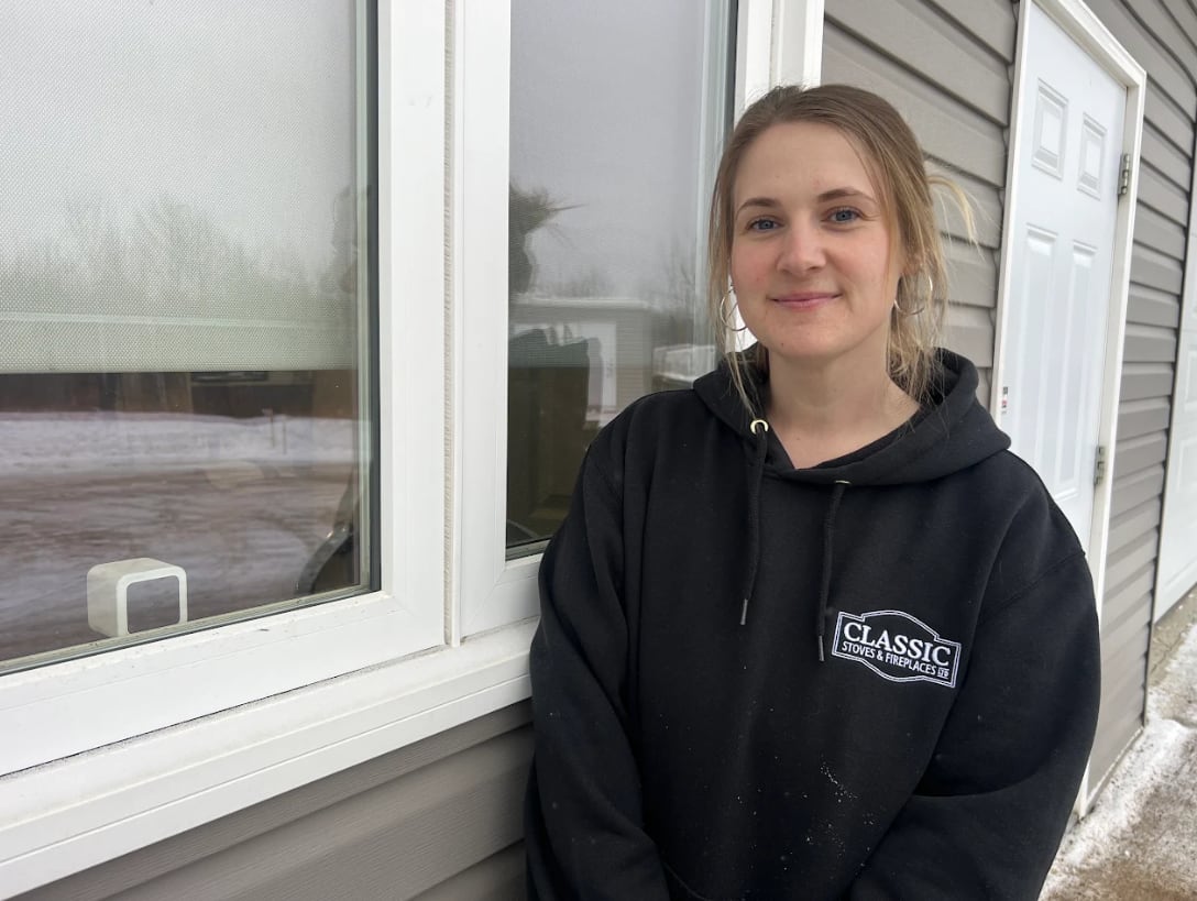 A woman poses for a photo