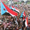 Supporters of the Southern Transitional Council (STC), a coalition of separatist groups seeking to restore the state of South Yemen, hold South Yemen flags during a rally, in Aden, Yemen, Friday.