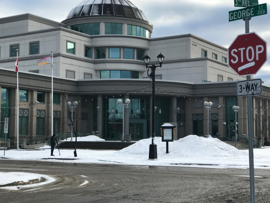 A courthouse building with a domed roof. 