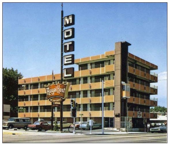 A motel with the words 'Royal Host' is seen in a dated picture.