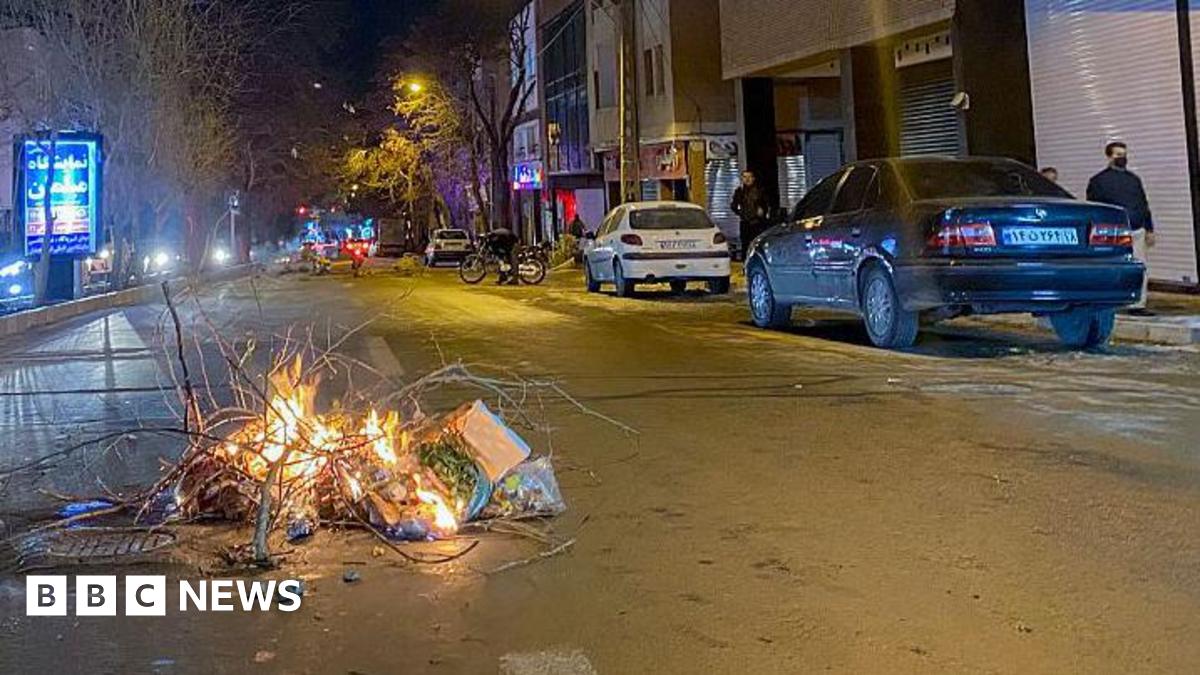 Burning debris in a road at night-time in Hamedan, Iran (01/01/26)