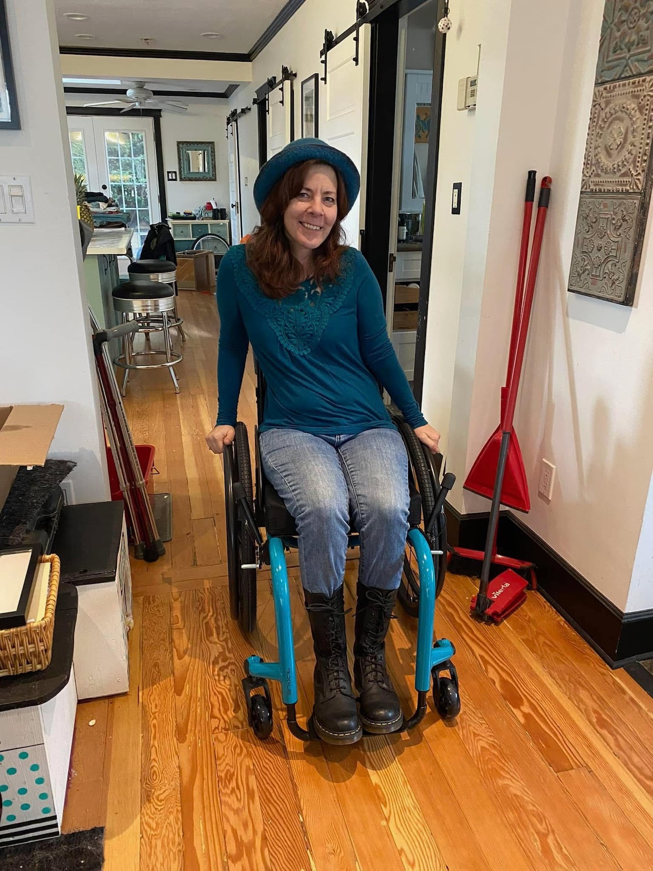 Bronwyn Berg has been using a wheelchair for about nine years, and says the electronic device that helps her maneuver it allows her to get out and about more.