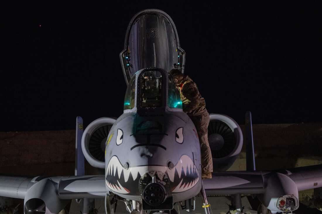 This photo provided by the U.S. Air Force shows a U.S. Airman preparing an A-10 Thunderbolt II for flight from a base in the U.S. Central Command area of responsibility, Friday, Dec. 19, 2025, in support of Operation Hawkeye Strike.