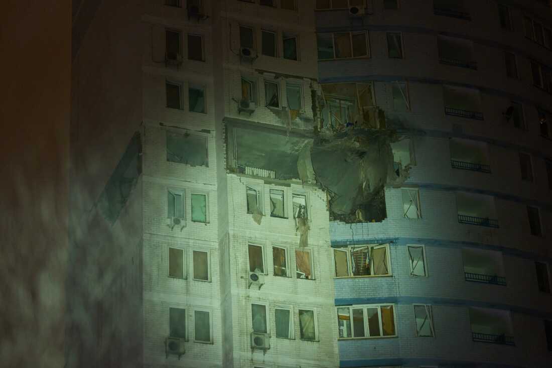 A residential building is damaged after a Russian air strike during a heavy snow storm in Kyiv, Ukraine, early Friday, Jan. 9, 2026.