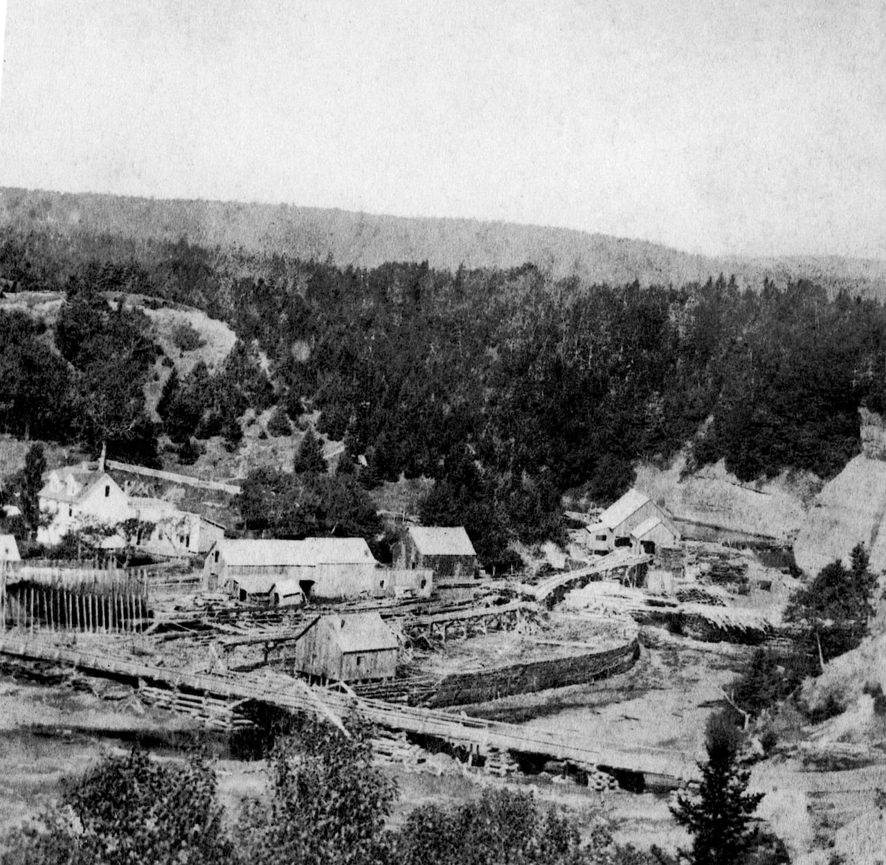 A black and white photo of a ship yard