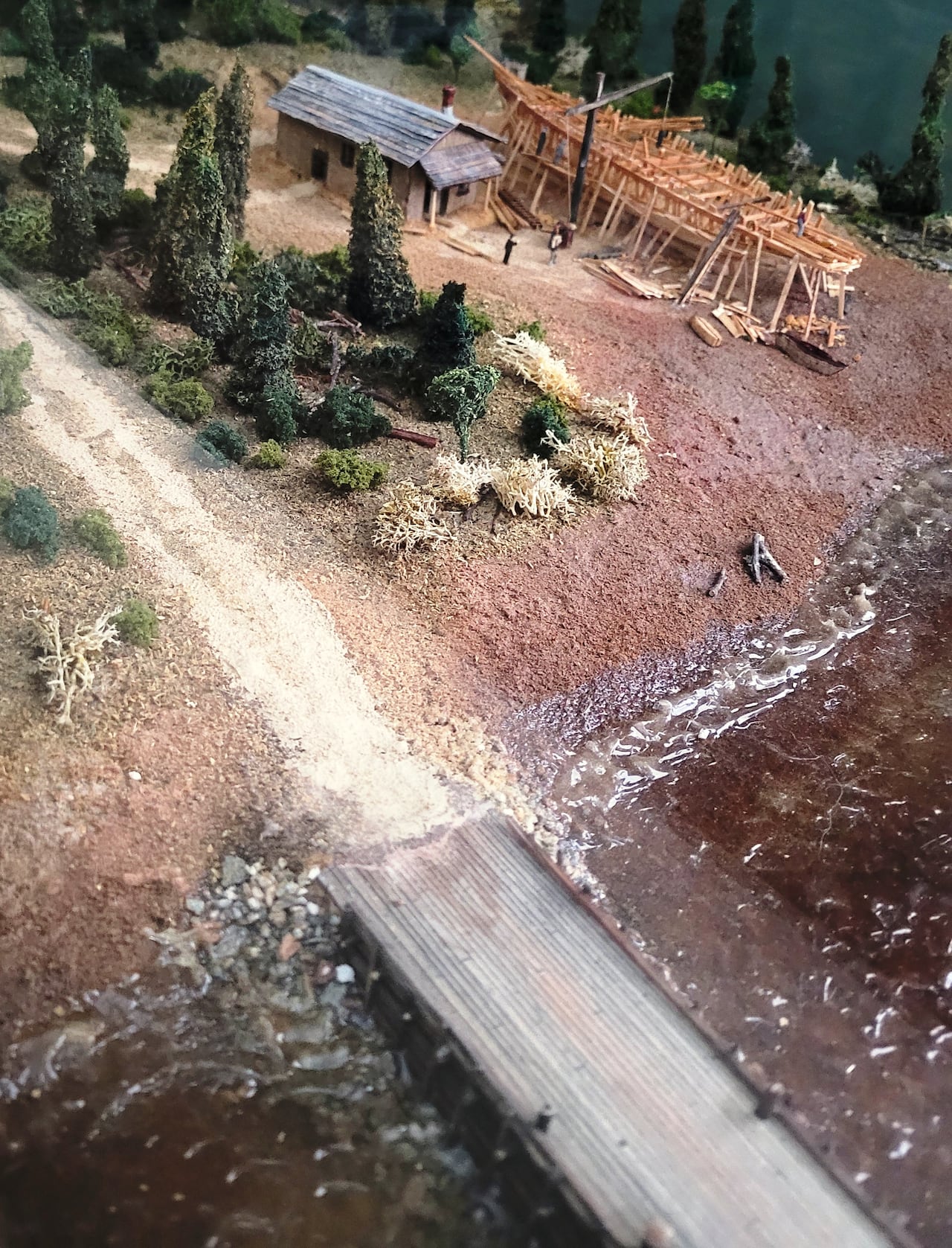 A diorama of a shipyard