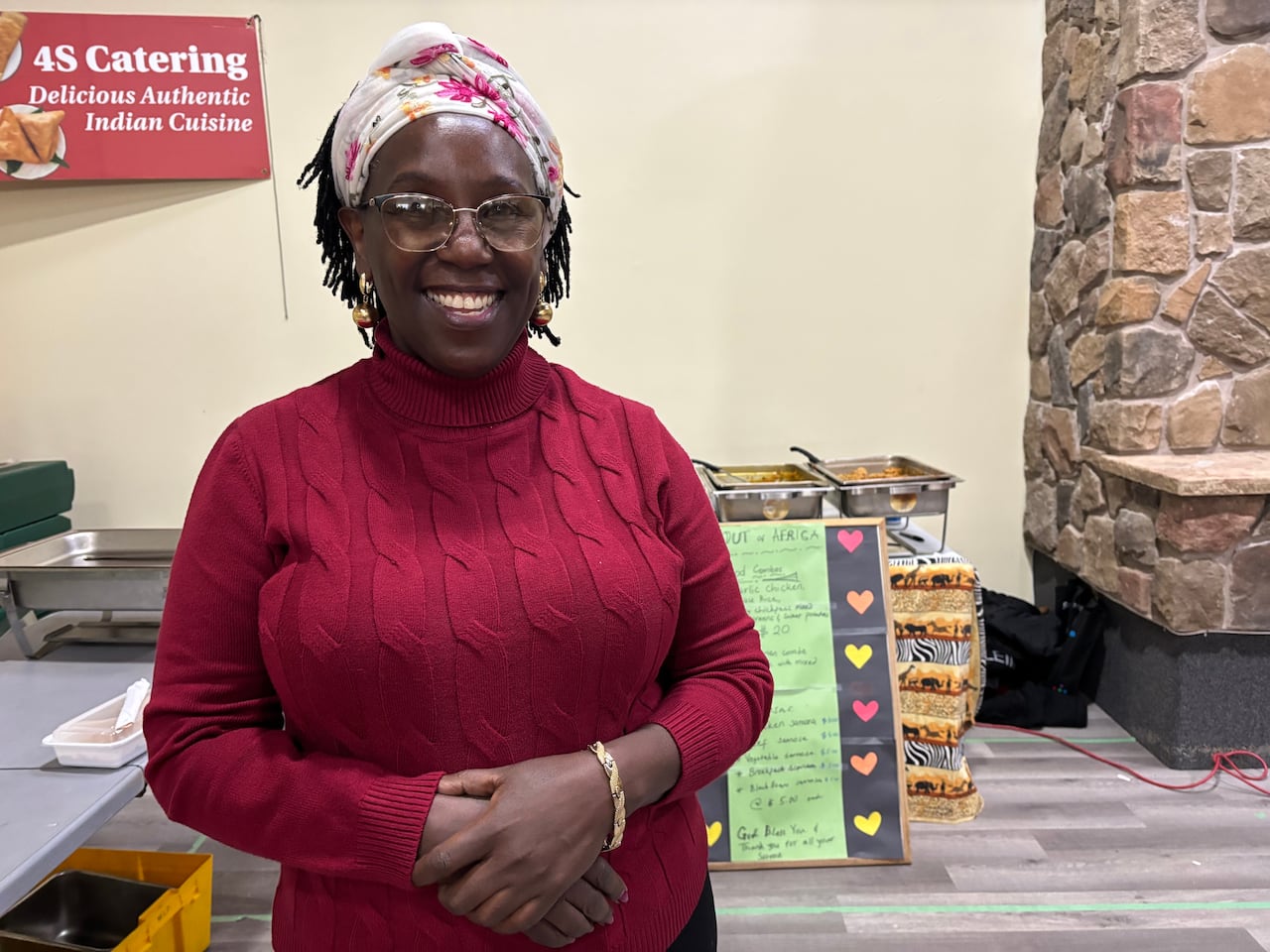 A woman in a red sweater.