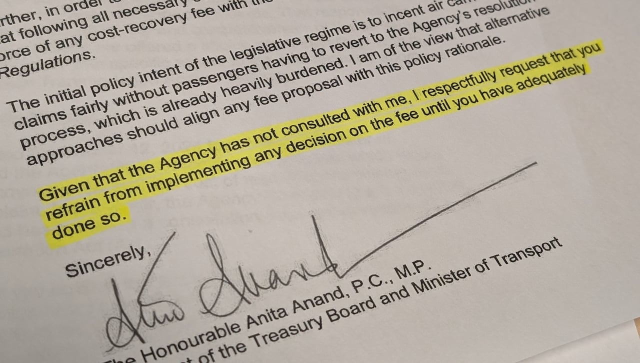 Paper with black and white typed text and three lines highlighted in yellow