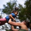 Rumley plays with her daughter after they finished work and daycare for the day. Rumley loves being outdoors, and teaches Lorelei to appreciate nature too.