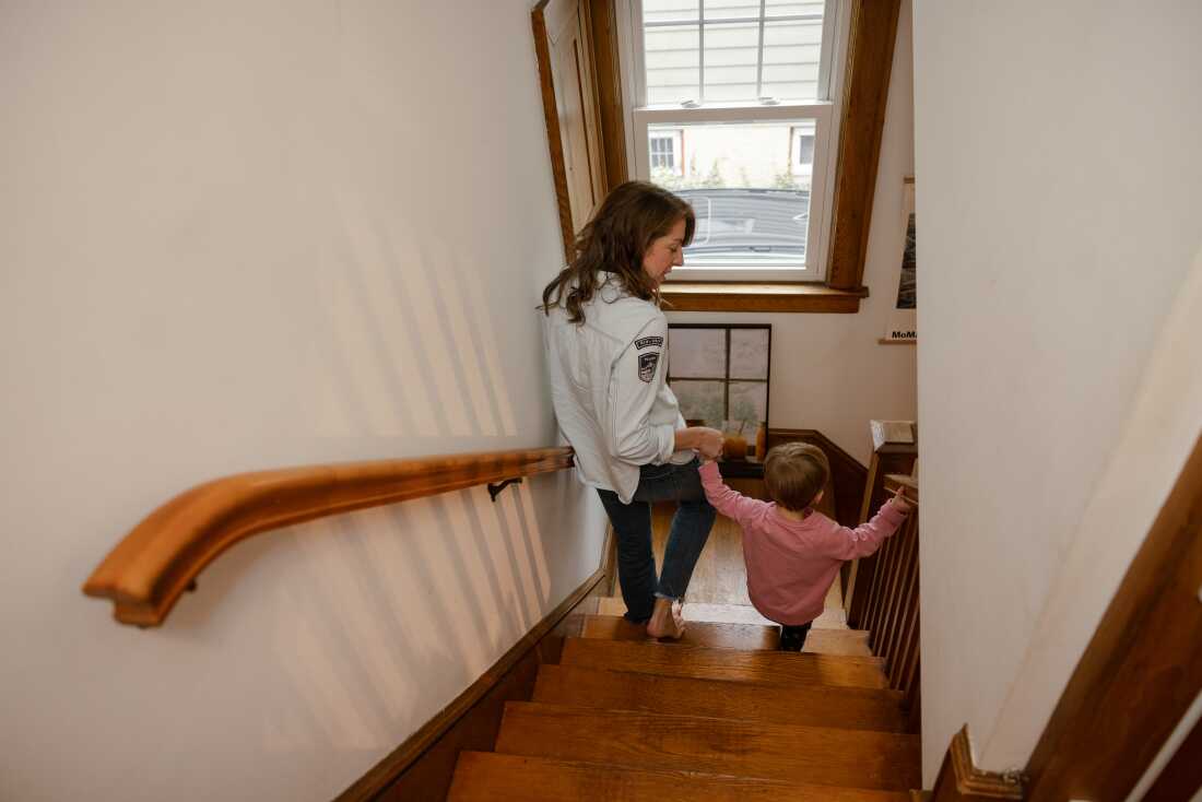Kate Snyder and her 2-year-old daughter get ready for daycare at their home in Northern New Jersey. An interior designer and artist, Snyder made the decision to undergo IVF when she was in her 40s.