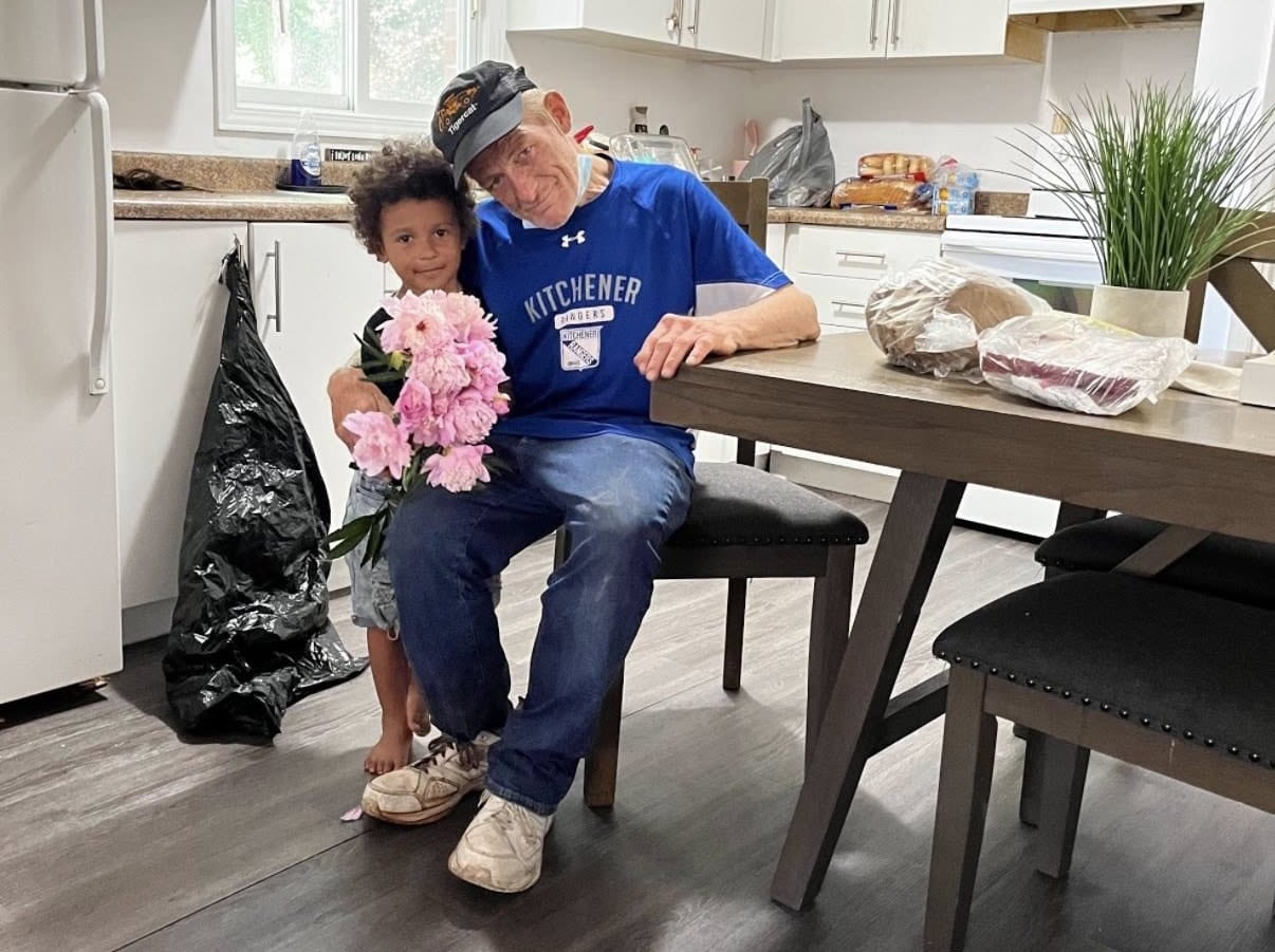 Smiling grandfather and kid