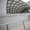 A Smithsonian Institution sign is seen on the National Air and Space Museum on the National Mall in Washington, DC. In March, President Trump signed an executive order to reshape and remove contact that “portrays American and Western values as inherently harmful and oppressive” and promote "American greatness" at the Smithsonian Institute, and it's collection of 21 museums, 14 education centers and the National Zoo.
