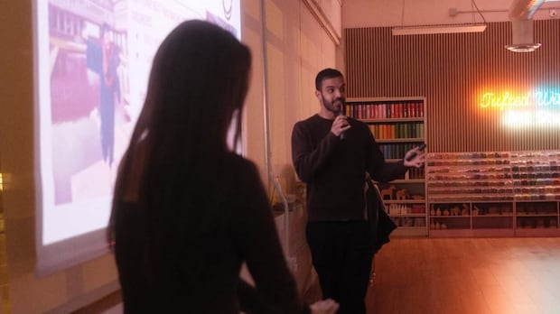 'Meet cute' dating event in Vancouver lets people pitch their friends in a PowerPoint presentation