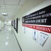 Federal agents patrol the halls of immigration court at the Jacob K. Javitz Federal Building on Aug. 28.