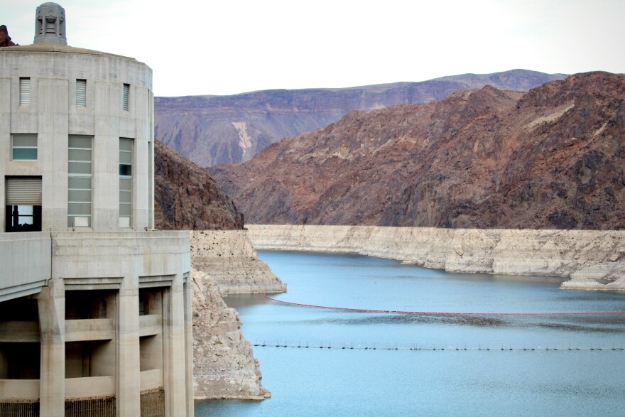 Water in Lake Mead sits low behind Hoover Dam on December 16, 2021. The nation's largest reservoir, which has reached record-low levels in recent years, serves as the main source of water for the Las Vegas area. It is mostly filled with mountain snowmelt from Utah, Colorado, Wyoming and New Mexico.