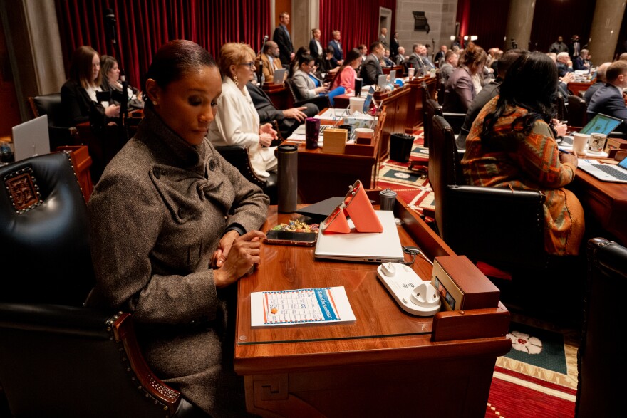 Rep. Raychel Proudie, D-Ferguson, plays a custom bingo game during Missouri Gov. Mike Kehoe’s annual State of the State address on Tuesday, Jan. 13, 2026, at the Capitol in Jefferson City. The DIY board includes spots like “ICE,” “Trump,” and “Radical Left.”