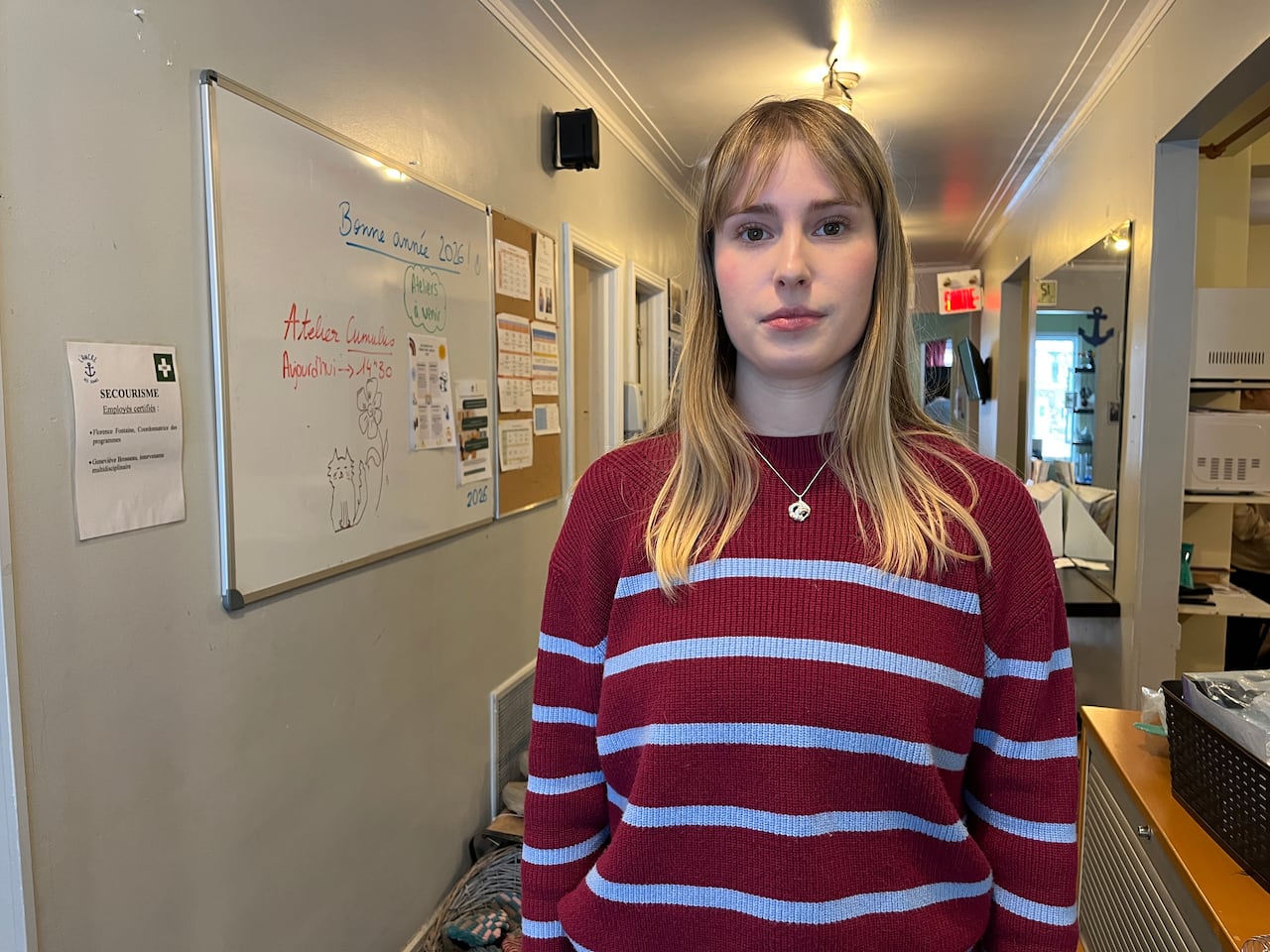 Portrait of a woman looking into the camera.