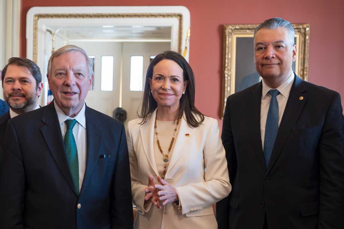 Venezuelan opposition leader Maria Corina Machado, center, is welcomed by Sen. Dick Durbin, D-Ill., left, Sen. Ruben Gallego, D-Ariz., far left, and Sen. Alex Padilla, D-Calif., right, as the Nobel Peace Prize recipient visits American leaders at the Capitol in Washington, Thursday, Jan. 15, 2026.