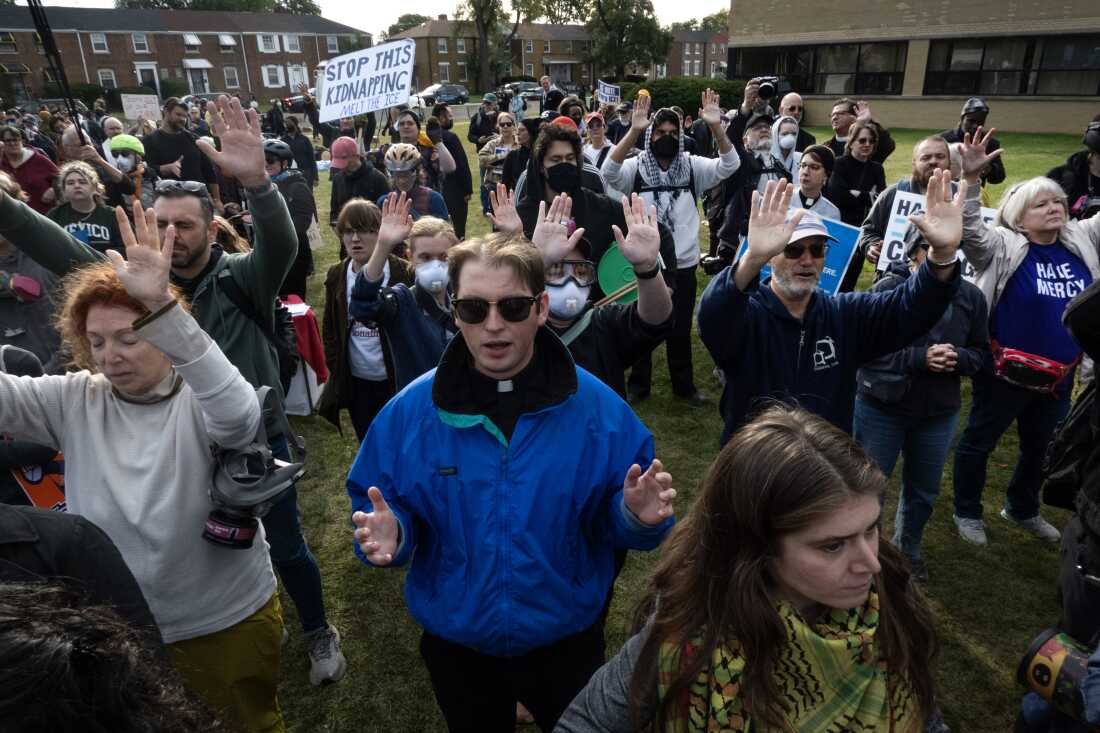 Demonstrators, including many clergy, protest near the immigration processing and detention facility on Oct. 10, 2025 in Broadview, Illinois.