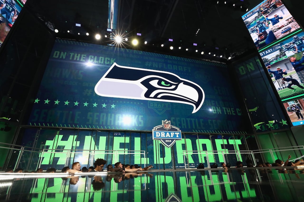 The Seattle Seahawks logo is seen on a video board during the first round of the 2018 NFL Draft