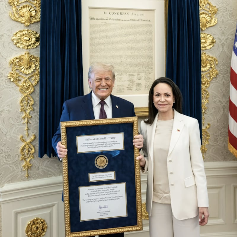 Venezuelan opposition leader Maria Corina Machado presents Donald Trump with her Nobel Peace Prize.