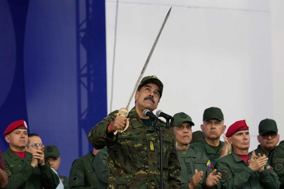 Nicolas Maduro brandishes a sword on Nov. 25, 2025, in Venezuela's capital Caracas, when he was still the country's president. U.S. forces seized Maduro on Jan. 3, part of President Trump's more aggressive foreign policy that has included multiple military operations in the past year.