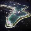 This image released by the U.S. Navy shows an aerial view of Diego Garcia, a remote island in the Indian Ocean.