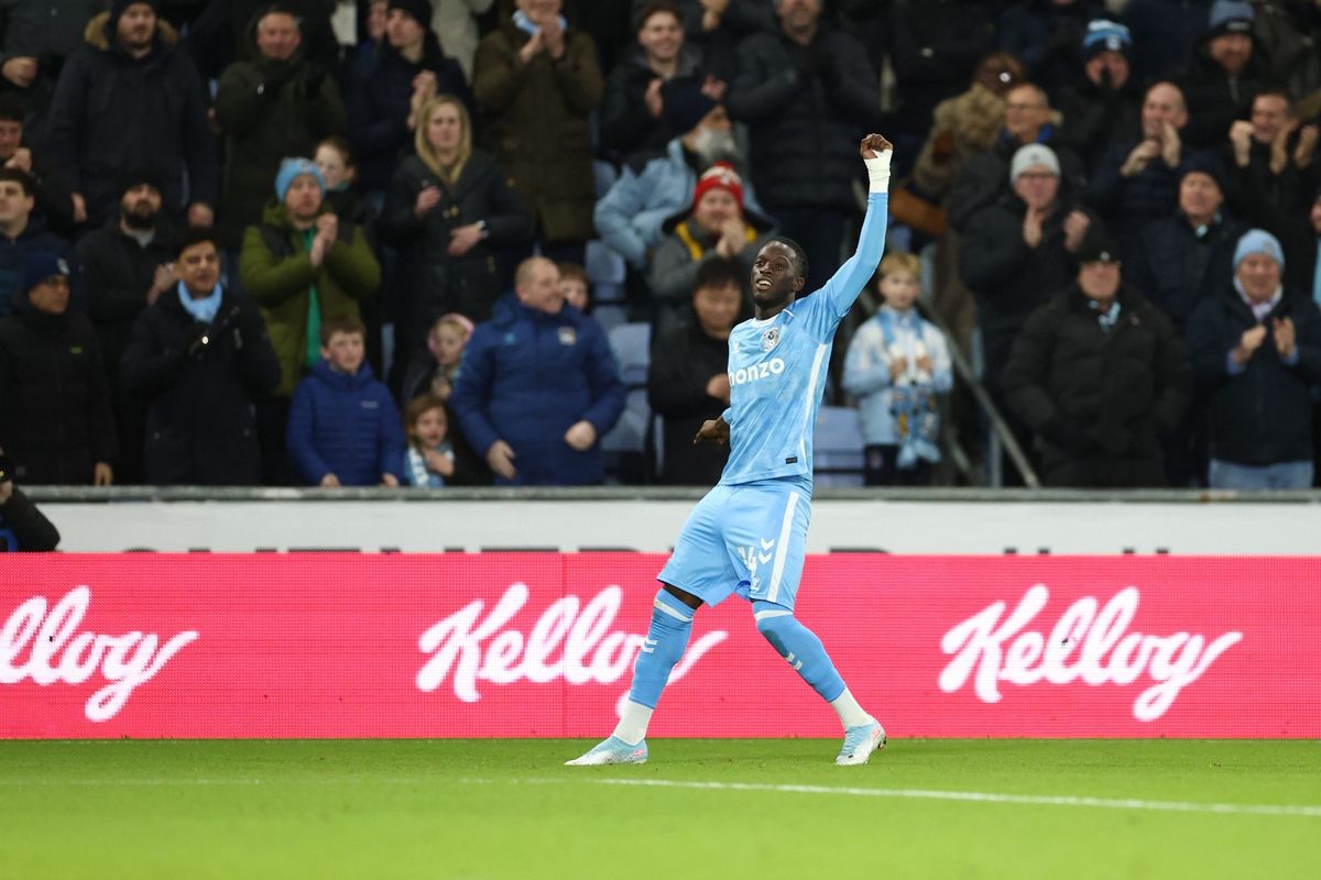 Romain Esse of Coventry City scores a goal and celebrates 1-0.