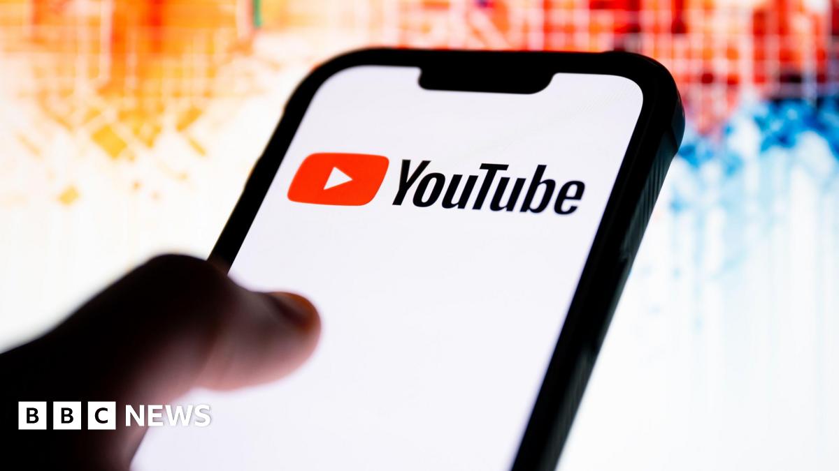 In this photo illustration, a YouTube logo seen displayed on a smartphone.