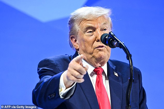 TOPSHOT - US President Donald Trump gestures as he delivers a special address during the World Economic Forum (WEF) annual meeting in Davos on January 21, 2026. The World Economic Forum takes place in Davos from January 19 to January 23, 2026. (Photo by Mandel NGAN / AFP via Getty Images)