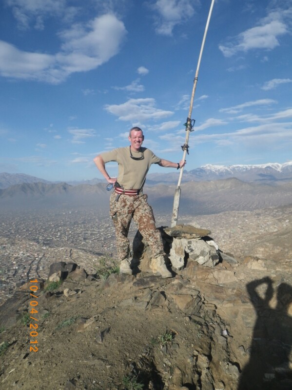 Then Colonel Soren Knudsen poses for a photo on the outskirts of Kabul, Afghanistan, April 10, 2012. (Soren Knudsen via AP)