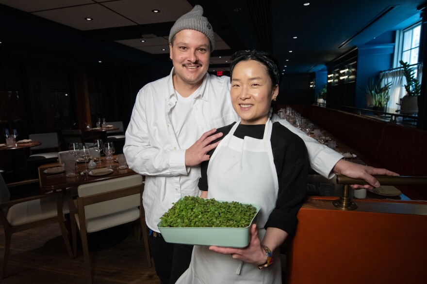 The husband and wife team of executive chef Johnny Leach and executive pastry chef Helen Jo Leach, at The Town Company. Helen Jo grows fresh herbs like lemon balm to use as garnishes.