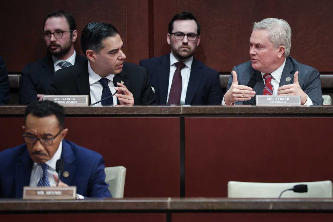 House Oversight and Government Reform Committee chairman Rep. James Comer, R-Ky. (pictured right), and ranking member Rep. Robert Garcia, D-Calif., confer during a hearing Wednesday on whether to hold former President Bill Clinton and former Secretary of State Hillary Clinton in contempt of Congress.