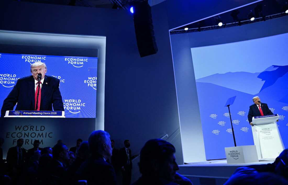 President Trump is shown on a big screen as he delivers a special address during the World Economic Forum annual meeting in Davos on Jan. 21.
