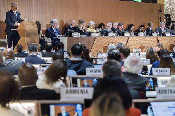 Director General of the World Health Organization (WHO) Tedros Adhanom Ghebreyesus, left, delivers his statement, during the opening of the 78th World Health Assembly at the European headquarters of the United Nations in Geneva, Switzerland, May 19, 2025. (Magali Girardin/Keystone via AP, File)