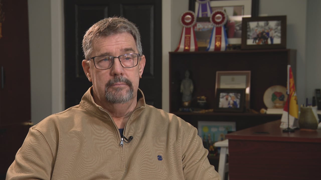 A man poses for a photo