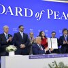 President Trump holds up his signature on the founding charter during a signing ceremony for the Board of Peace at the World Economic Forum on Thursday in Davos, Switzerland. The final makeup of the board has not been confirmed. (Photo by Chip Somodevilla/Getty Images)