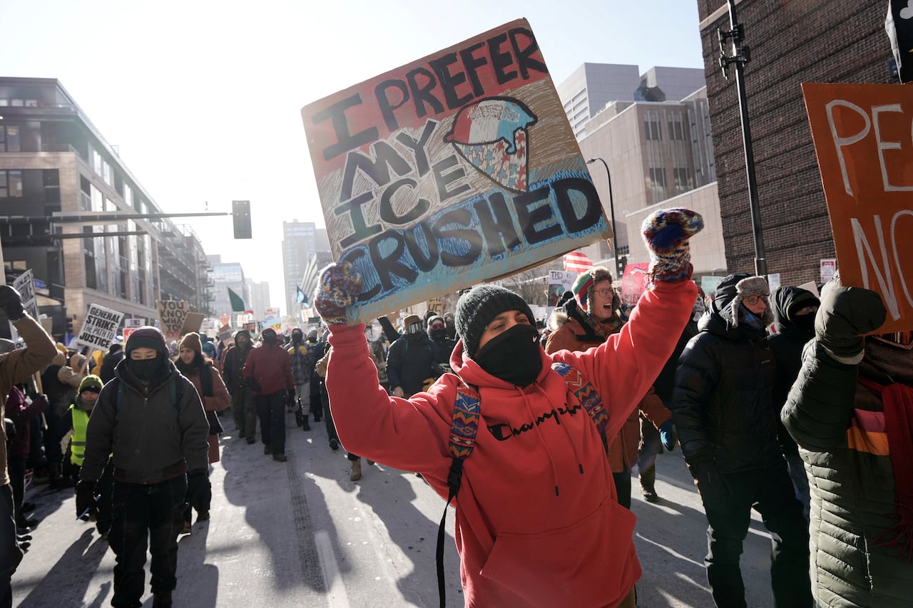 A crowd of people participating in an anti-ICE protest in Minneapolis, Minnesota