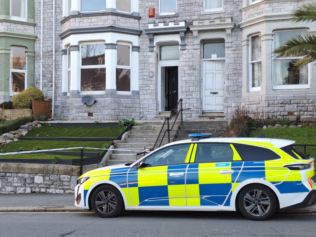 Police on scene guard following acid attack incident in Lipson Road, Plymouth