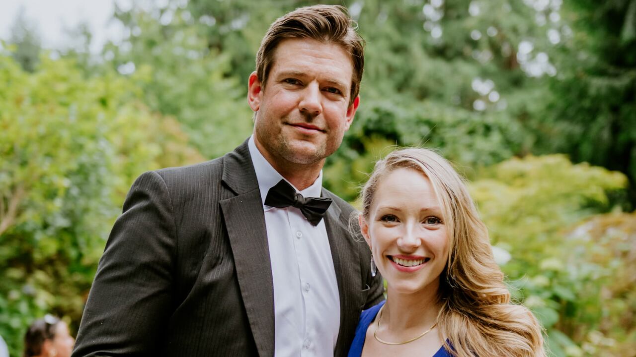 Couple standing smiling