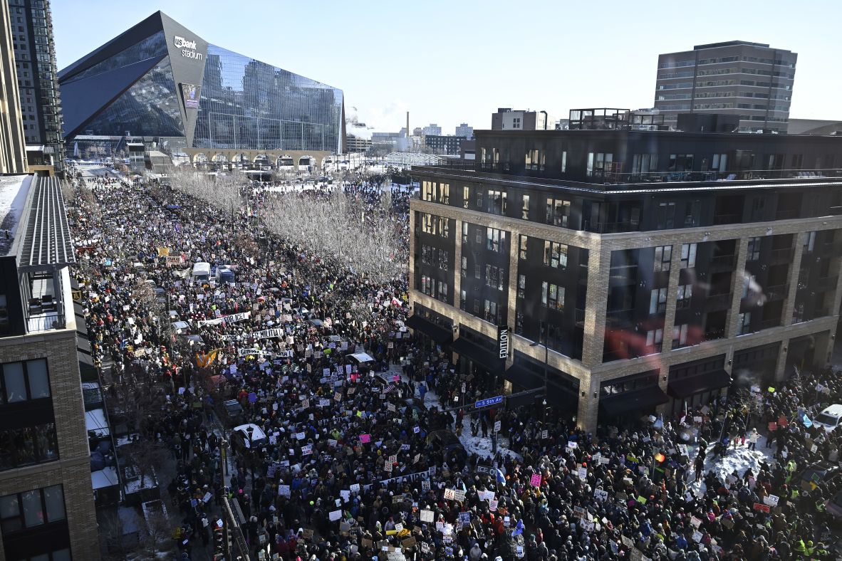 Demonstrators participate in a rally and march during an 