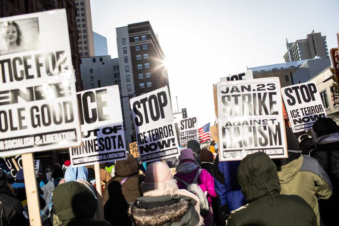 Thousands gather downtown in sub-zero temperatures as hundreds of Minnesota businesses close in a statewide “ICE Out” protest and strike against federal immigration enforcement and the expanded ICE operations in Minneapolis, Minnesota, Jan. 23, 2026. Photographed by Erin Trieb for NPR.